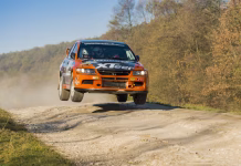 Tilen Likar, mladi državni prvak v rallyju Lviv, Ukraine - November 1, 2015: Ivan Ostapchenko's Mitsubishi Lancer Evo VII (No. 11) competes at the annual Rally Galicia