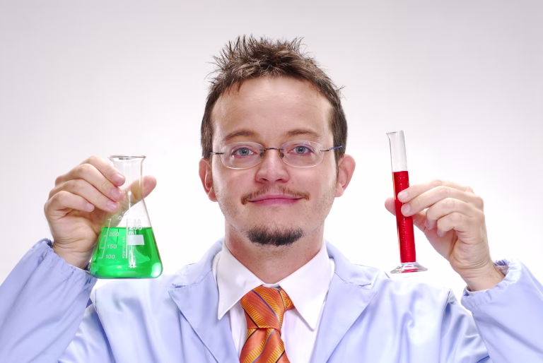One young scientist holding an experimental tubes.