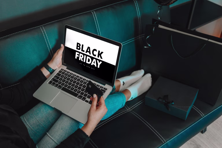 Online payment, Women hands holding credit card and using laptop for online shopping. Black Friday and Cyber Monday Concept