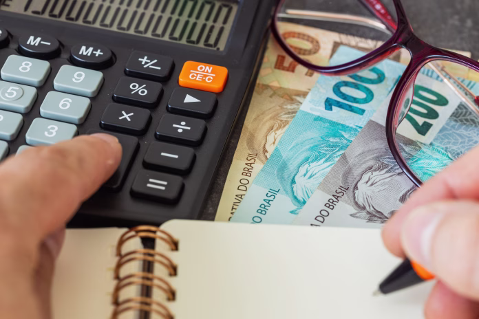 financial-settlements-in-brazilian-reais-financial-analysis-tax-calculation-risk-costs-business-project-brazil-money-close-up-stockpack-istock Financial settlements in Brazilian reais, Financial analysis, Tax calculation, Risk costs, business project. Brazil money, close up.