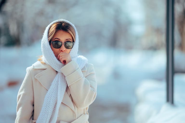 Sick lady sneezing suffering from grippe not feeling well