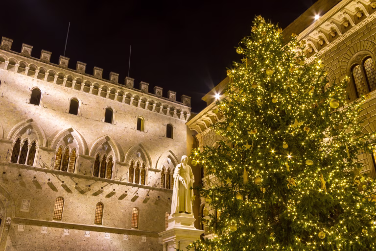 Siena, Italy - December 08, 2015:  Palazzo Salimbeni, headquarters of the Monte dei Paschi di Siena bank at Christmas time