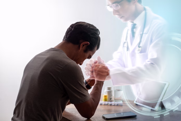 A conceptual image showing a man in emotional distress receiving comfort and support from a virtual doctor, symbolizing AI-powered telemedicine. The transparent doctor figure represents futuristic medical technology offering mental health care remotely. Ideal for topics related to mental wellness, artificial intelligence in healthcare, and emotional support through digital means.