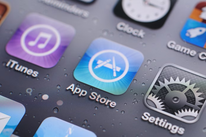 "Hong Kong, China - November 11, 2011: iPhone 4s screen closeup with iTunes and App Store. iPhone 4s is the fifth generation of Apple smartphone."