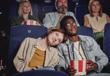 Kako nas filmi lahko naučijo medkulturne komunikacije? Portrait of modern lovey-dovey ethnically diverse young couple spending evening on date at cinema