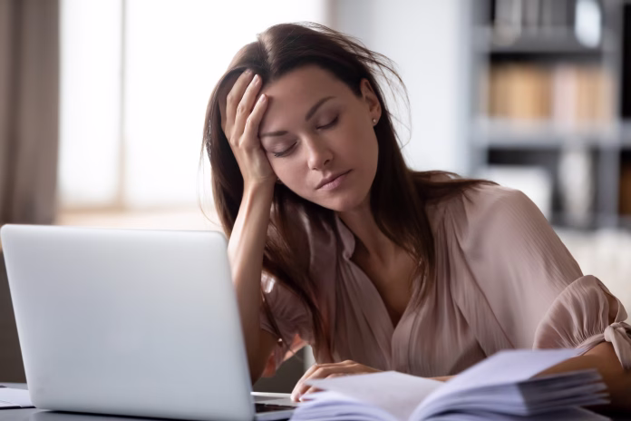 tired-millennial-girl-student-sit-at-desk-fall-asleep-studying-late-hours-at-laptop-at-home-exhausted-young-woman-take-nap-sleep-at-workplace-working-on-computer-exhaustion-fatigue-concept-stockpack-istock Tired millennial girl student sit at desk fall asleep studying late hours at laptop at home, exhausted young woman take nap sleep at workplace working on computer, exhaustion, fatigue concept