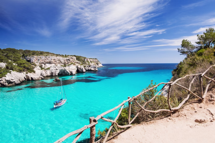 beautiful-bay-with-sailing-boats-menorca-island-spain-stockpack-istock Beautiful bay with sailing boats, Menorca island, Spain