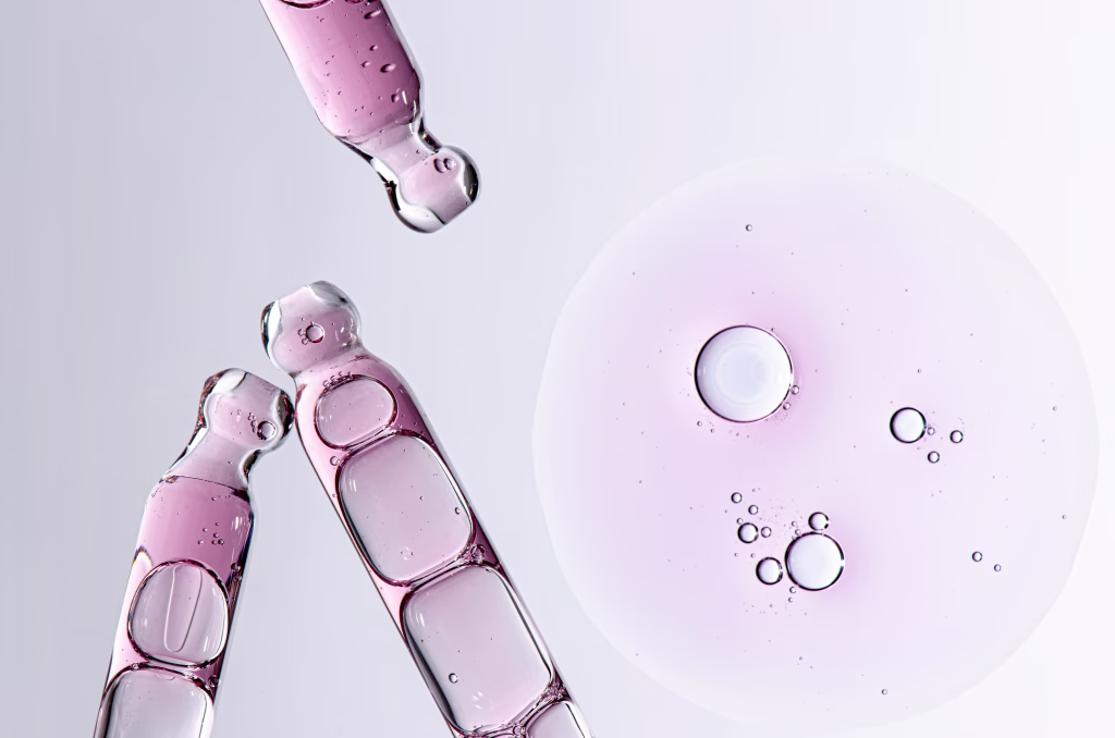Skin serum in a pipette. A cosmetic product for body care. White background