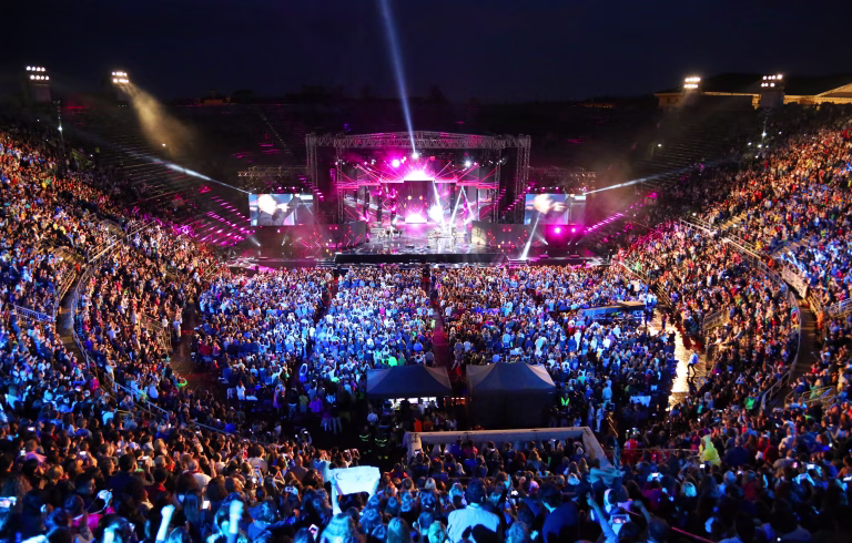 Verona, VR, Italy - June 5, 2017: Live concert inside the Ancient Roman Arena with many people and stage