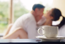 Kako pogosto bi morali imeti spolni odnos? Blurred asia people young adult body on hotel cozy sofa bed outdoor home in health care safe sex flirt relax hug kiss. I love you man woman falling in love tender sexual pose happy asian just married.