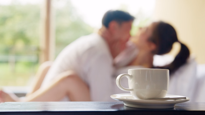 Blurred asia people young adult body on hotel cozy sofa bed outdoor home in health care safe sex flirt relax hug kiss. I love you man woman falling in love tender sexual pose happy asian just married.