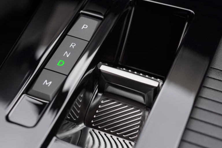Close up of modern automatic transmission in D position (Drive)