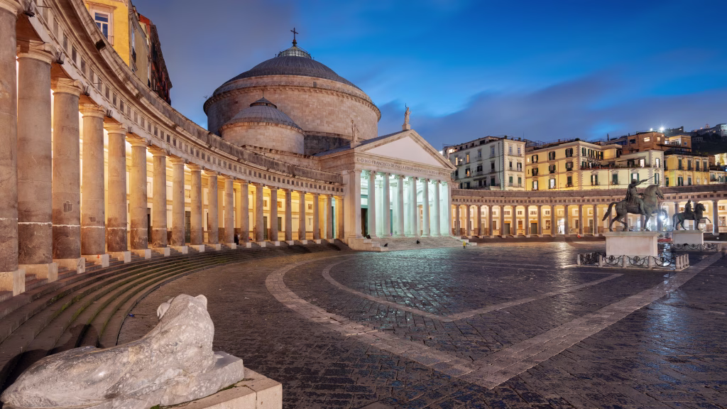 Naples, Italy at Piazza del Plebiscito at dusk.