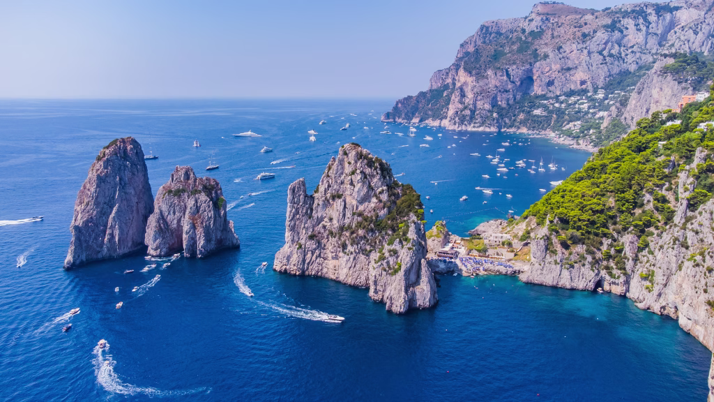 The Amalfi Coast is a breathtaking stretch of coastline in southern Italy, known for its vertiginous cliffs adorned with colorful villages, turquoise waters, and lush terraced gardens. Its beauty captivates the senses, offering a sublime blend of natural splendor and Italian charm that is nothing short of magical.