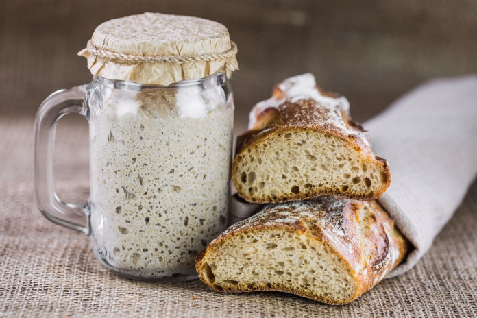 the-leaven-for-bread-is-active-starter-sourdough-the-concept-of-a-healthy-diet-stockpack-istock The leaven for bread is active. Startersourdough. The concept of a healthy diet