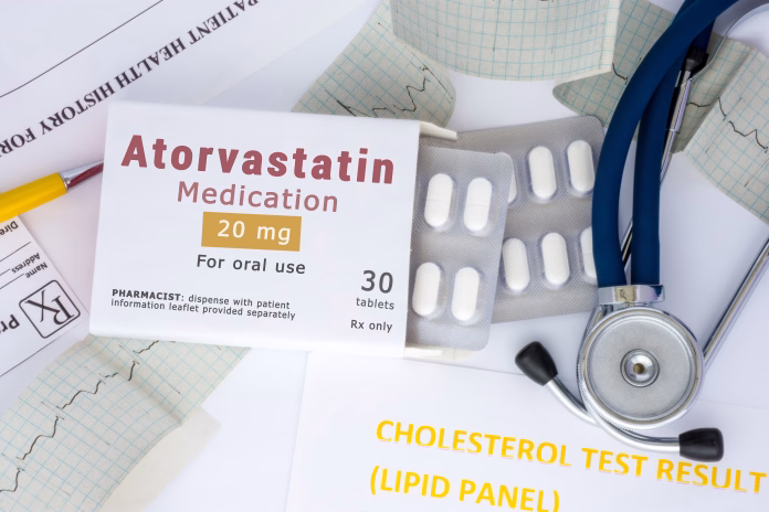 Atorvastatin active ingredient in drug as international nonproprietary name of active pharmaceutical substance concept photo. Packaging with label "Atorvastatin medication"