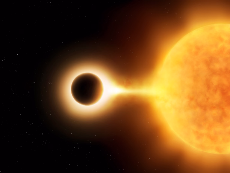 Black hole absorbs gas from red giant's atmosphere. Singularity destroys supermassive star. accretion process.