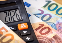 Ministrstvo razporedilo več kot 2 milijona sredstev za izplačilo štipendije Eurozone 2026 year. Financial business concept. Money and calculator with date 2026. Market analysis. Euro currency. exchange rate. Economic background. close up