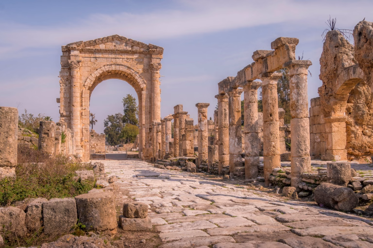 The Tyre necropolis triumphal arch and the road with columns, at UNESCO archeological historic site, in Sour, Lebanon.