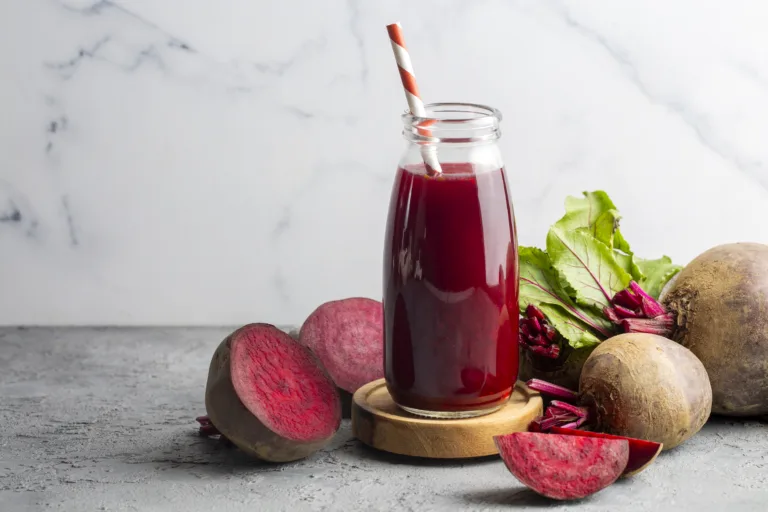 Glass of fresh beetroot juice with vegetables - beetroot smoothie