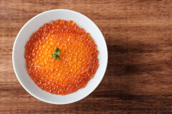 top-view-of-salmon-roe-ikura-in-a-white-bowl-with-copy-space-for-your-text-stockpack-istock Top View of Salmon Roe (Ikura) in a White Bowl with copy space for your text.