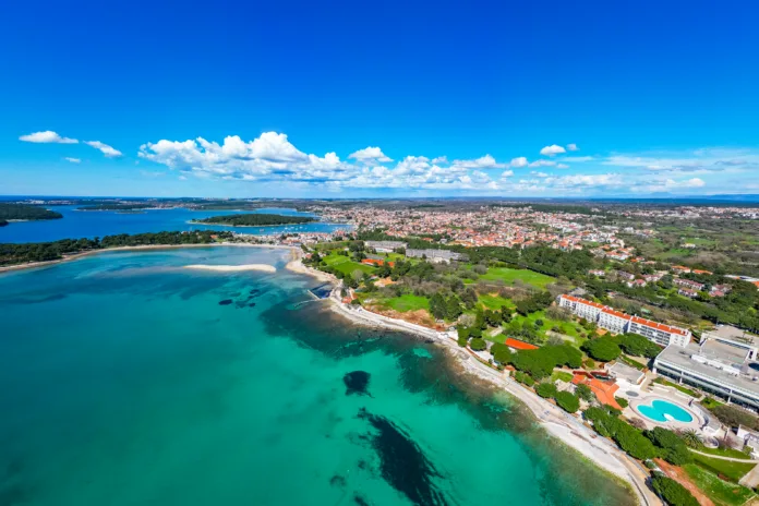 Aerial drone view of beautiful Medulin city in Istria, Croatia. Amazing sea side photo of tourist attraction Medulin near Pula, Croatia