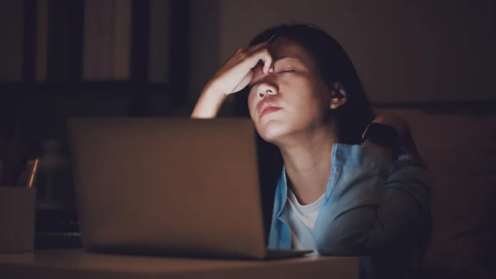 asian-woman-student-or-businesswoman-work-late-at-night-concentrated-and-feel-sleepy-at-the-desk-in-dark-room-with-laptop-or-notebookconcept-of-people-workhard-and-burnout-syndrome-stockpack-istock Asian woman student or businesswoman work late at night. Concentrated and feel sleepy at the desk in dark room with laptop or notebook.Concept of people workhard and burnout syndrome.