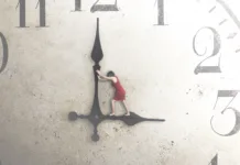 Sindrom stalne produktivnosti: Zakaj imamo slabo vest, ko končno nič ne delamo? business woman tries to stop the time