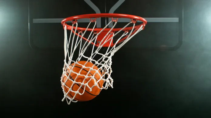 detail-of-basketball-ball-hitting-the-hoop-top-view-isolated-on-black-background-freeze-motion-of-sport-action-stockpack-istock Detail of basketball ball hitting the hoop, top view. Isolated on black background. Freeze motion of sport action.