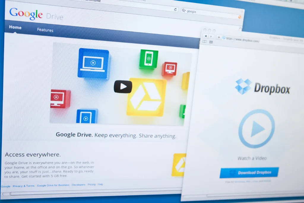 "Belluno, Italy - May 3, 2012: Google has opened its online drive ""Google Drive"". Home users and businesses to store up to five gigabytes of data for free, for a larger capacity is paid a monthly fee. Dropbox is a Web-based file hosting service operated by Dropbox."
