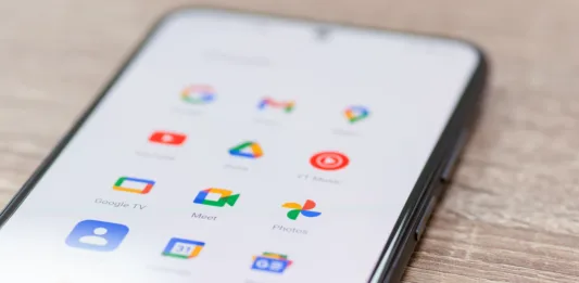 Chernihiv, Ukraine - December 22, 2022: Screen of smartphone with icons of Google apps grouped together. Close up shot of icons on mobile phone, global information sharing