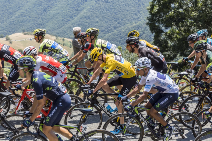 col-daspinfrance-july-152015-froome-of-team-sky-in-yellow-jersey-and-his-main-rival-quintana-of-movistar-team-in-white-jersey-climbinginside-the-peloton-the-road-to-col-daspin-in-pyrenees-mountains-du-stockpack-istock Col D'Aspin,France- July 15,2015: Froome of Team sky, in Yellow Jersey and his main rival Quintana of Movistar Team, in White Jersey, climbing,inside the peloton, the road to Col D'Aspin in Pyrenees Mountains during the stage 11 of Le Tour de France 2015.