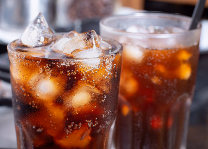 cola-with-crushed-ice-in-glass-and-there-is-water-droplets-around-cool-black-fresh-drink-stockpack-istock cola with crushed ice in glass and there is water droplets around. cool black fresh drink.