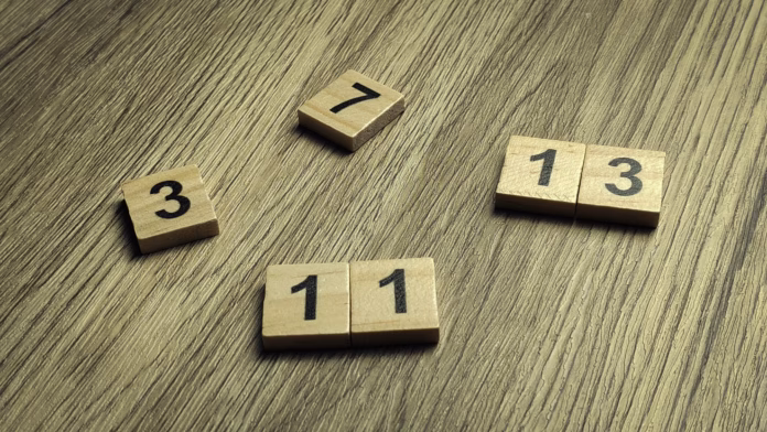 collection-of-prime-number-wooden-tiles-scattered-on-a-wooden-table-for-mathematics-and-education-concept-stockpack-istock Collection of prime number wooden tiles scattered on a wooden table for mathematics and education concept