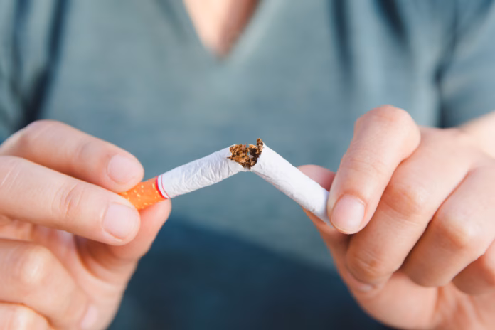 stop-cigarette-woman-hands-breaking-the-cigarette-with-clipping-path-stockpack-istock Stop cigarette, woman hands breaking the cigarette with clipping path
