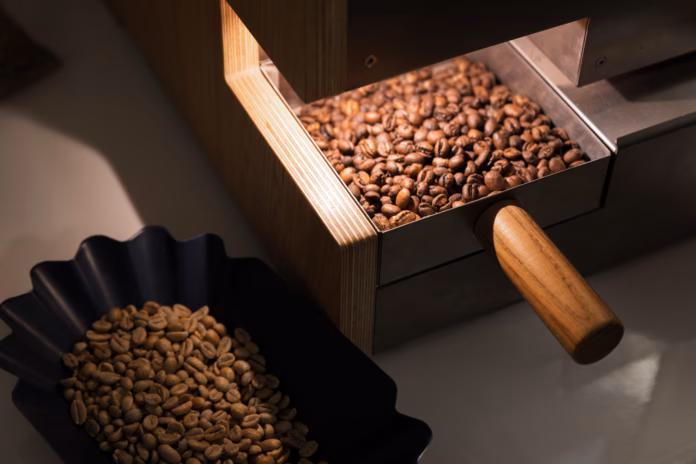 a-portion-of-roasted-arabica-coffee-beans-just-after-roasting-close-up-photo-stockpack-istock A portion of roasted arabica coffee beans just after roasting, close-up photo
