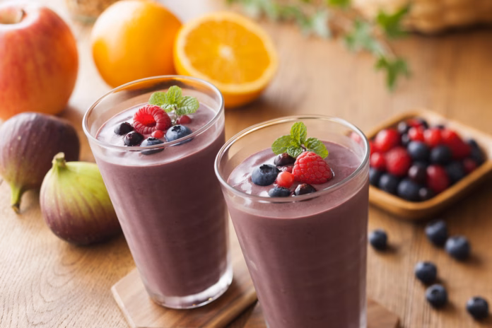 an-acai-smoothie-garnished-with-blueberries-and-raspberries-stockpack-istock An acai smoothie garnished with blueberries and raspberries.